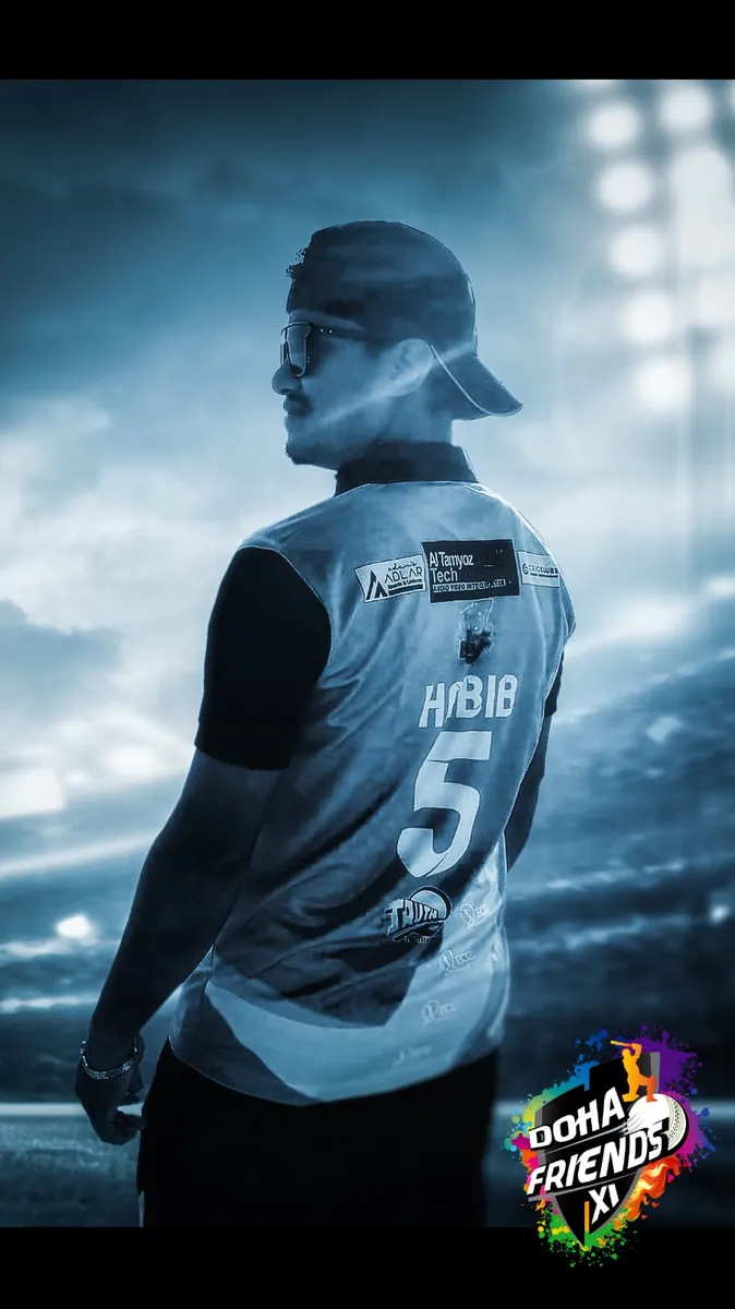 Back view of Habib's number 5 jersey under dramatic blue light