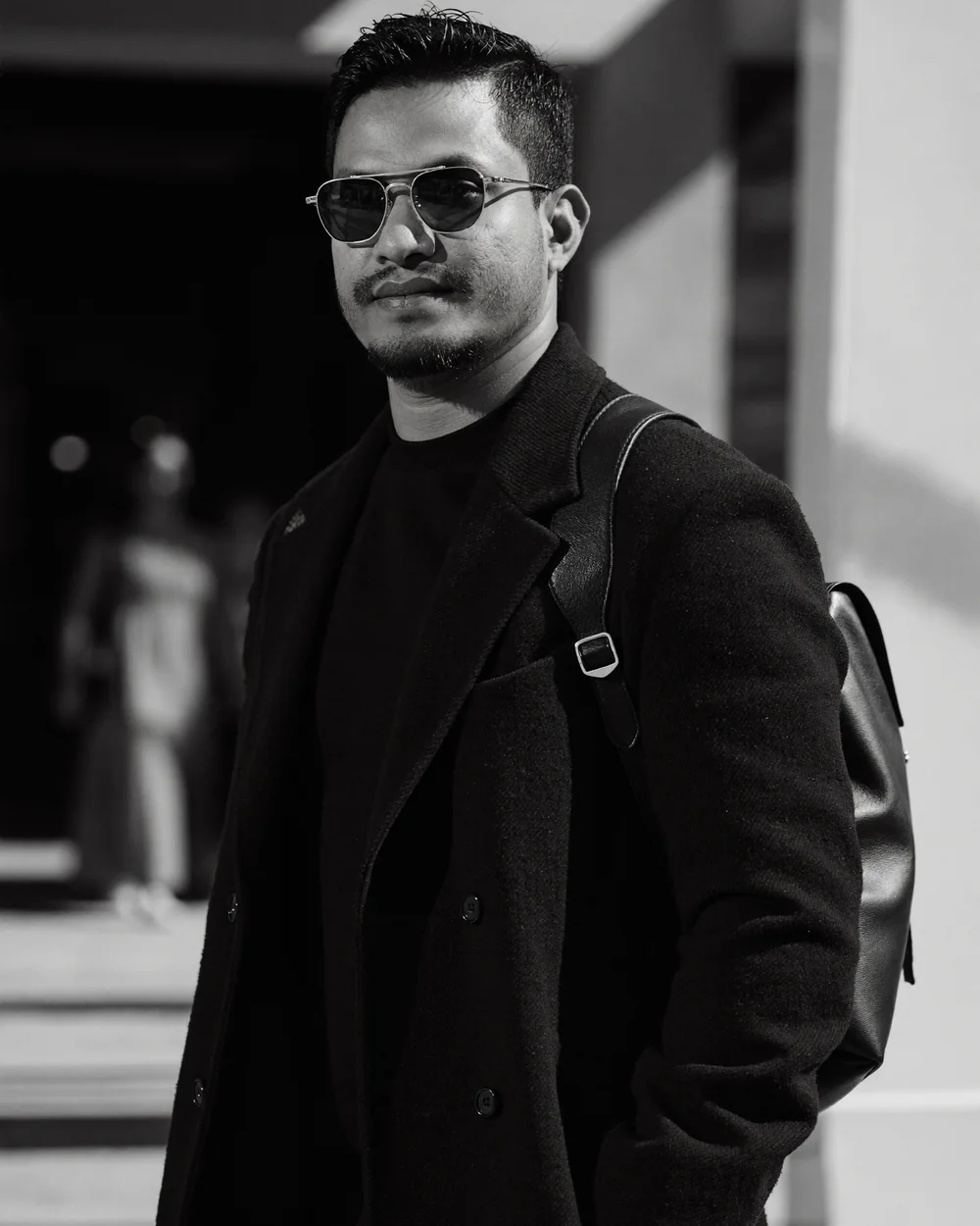 Md. Habib in a black coat and sunglasses